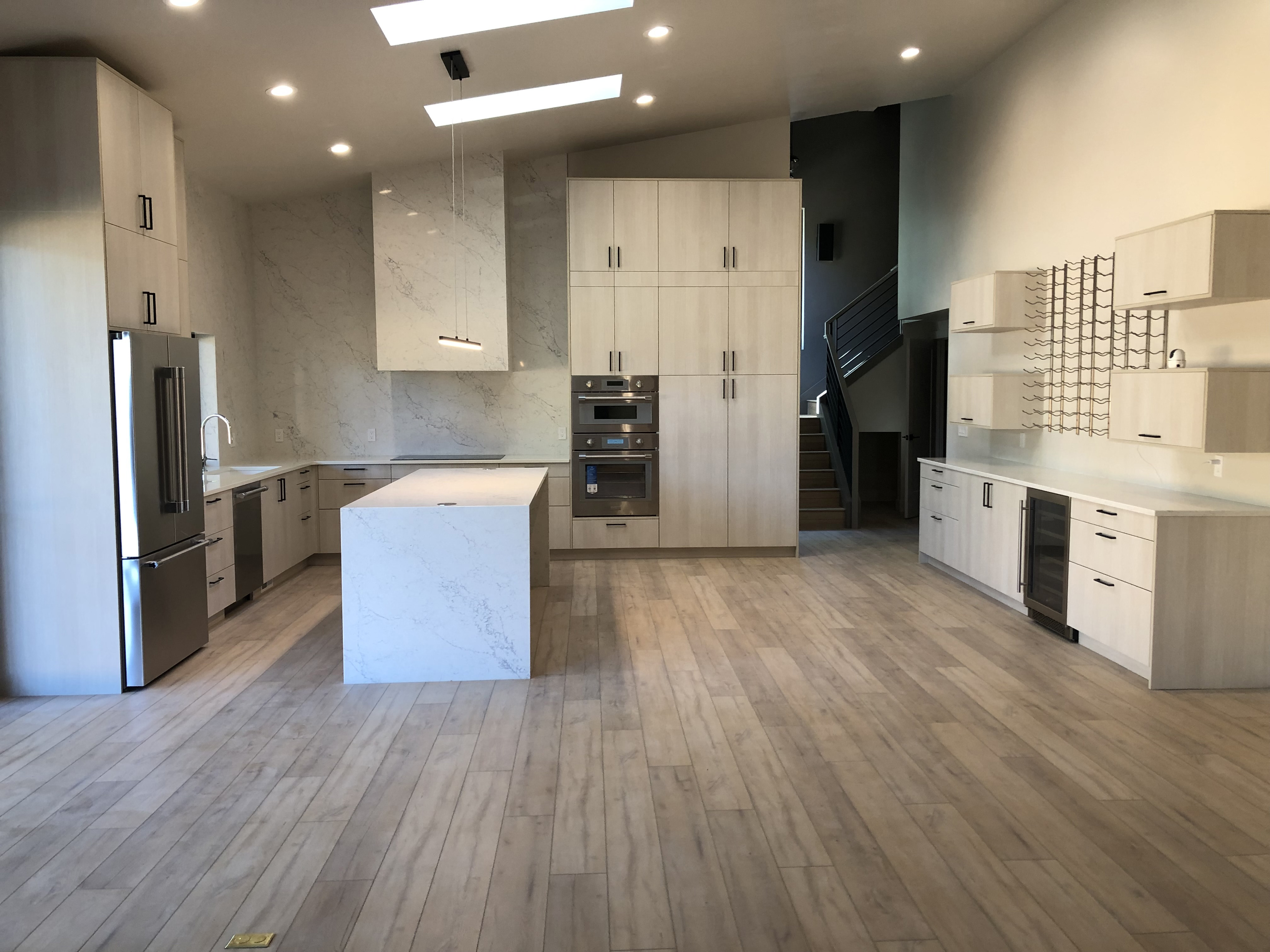 Bellevue new construction kitchen with quartz backsplash