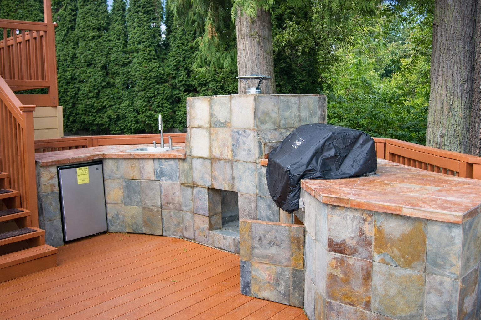 Outdoor kitchen and deck construction